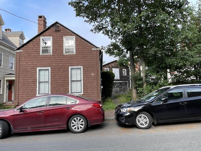 30 Dow St, Portland, ME 04102 - view of front facade with a chimney