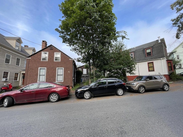 30 Dow St, Portland, ME 04102 - dutch colonial with a chimney