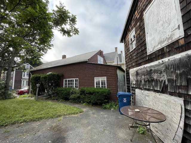 30 Dow St, Portland, ME 04102 - view of side of home featuring a lawn