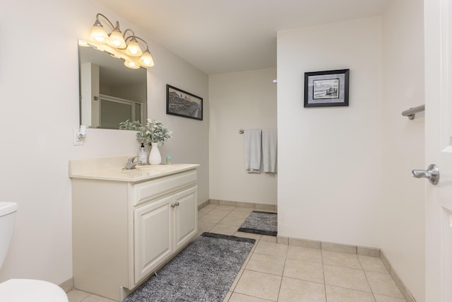1 E Grand Ave Unit 503, Old Orchard Beach, ME 04064 - full bathroom featuring vanity, tile patterned floors, and a shower with door