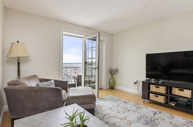1 E Grand Ave Unit 503, Old Orchard Beach, ME 04064 - living room featuring wood finished floors and baseboards