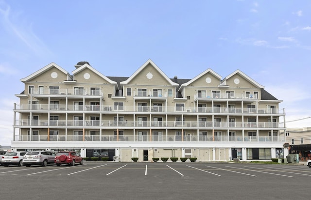 1 E Grand Ave Unit 503, Old Orchard Beach, ME 04064 - view of building exterior with uncovered parking