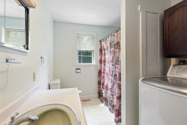 2672 N Belfast Ave, Augusta, ME 04330 - full bathroom featuring washer / clothes dryer, tile patterned floors, curtained shower, and vanity