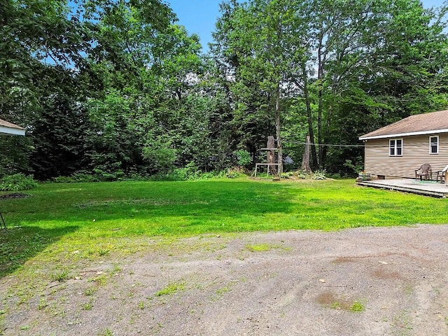 2672 N Belfast Ave, Augusta, ME 04330 - view of green lawn with a deck