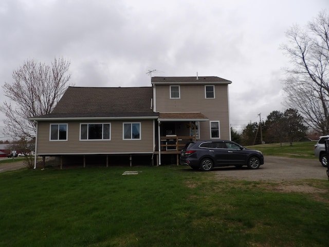 953 Pushaw Rd, Glenburn, ME 04401 - back of property with a lawn
