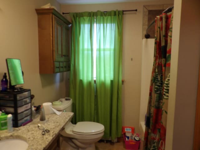 953 Pushaw Rd, Glenburn, ME 04401 - full bathroom with curtained shower and vanity