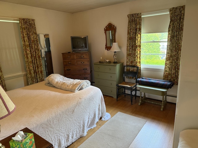 29 Birchwood Blvd, Brewer, ME 04412 - bedroom featuring wood finished floors and a baseboard heating unit