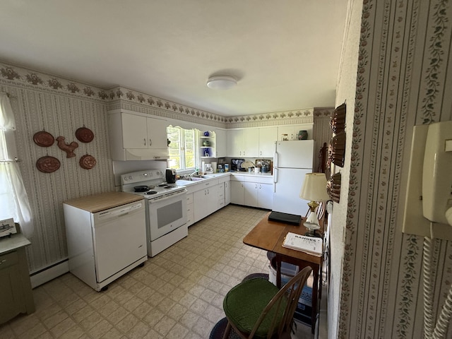 29 Birchwood Blvd, Brewer, ME 04412 - kitchen with white appliances, light flooring, baseboard heating, light countertops, and white cabinets