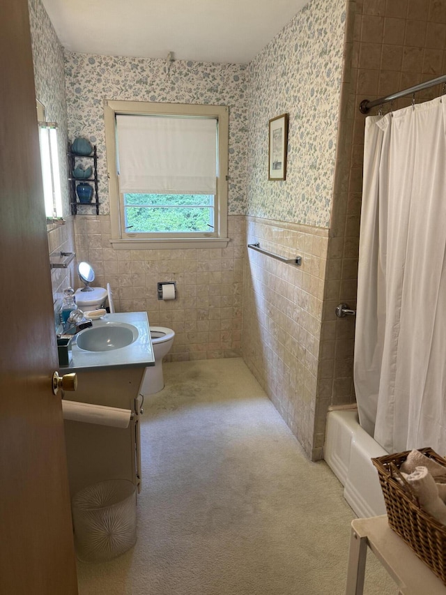 29 Birchwood Blvd, Brewer, ME 04412 - bathroom with tile walls, vanity, wainscoting, shower / tub combo, and wallpapered walls