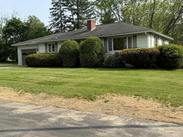 29 Birchwood Blvd, Brewer, ME 04412 - ranch-style home featuring a chimney, an attached garage, and a front lawn