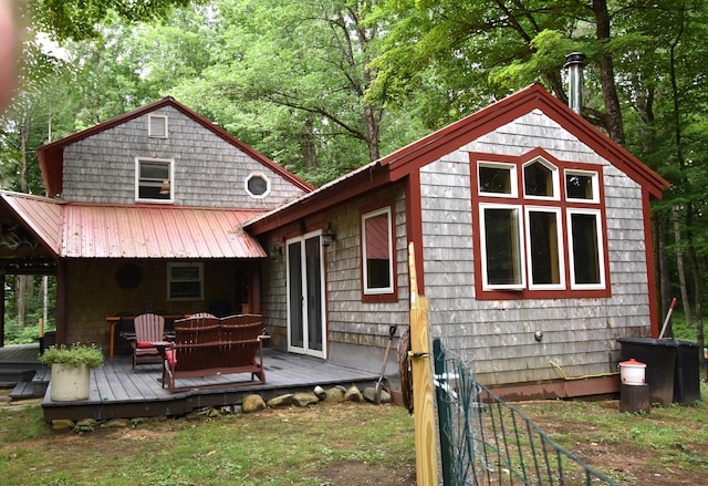 108 Maple Rd, Atkinson, ME 04426 - back of house featuring a deck and a metal roof