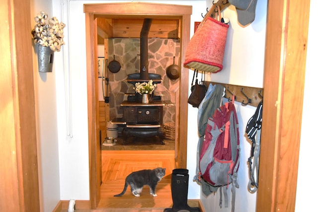 108 Maple Rd, Atkinson, ME 04426 - detailed view of baseboards and a wood stove