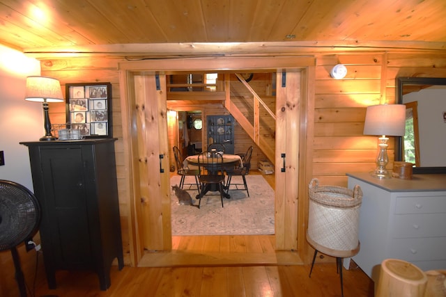 108 Maple Rd, Atkinson, ME 04426 - bedroom with wood ceiling, hardwood / wood-style flooring, and wood walls
