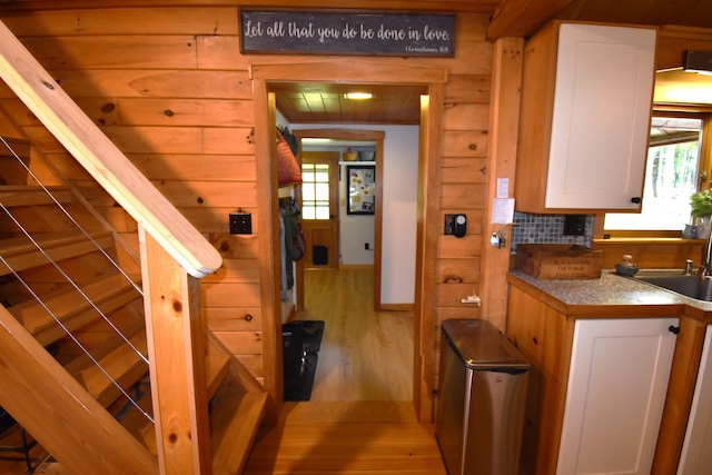 108 Maple Rd, Atkinson, ME 04426 - kitchen featuring light wood-style floors and white cabinetry