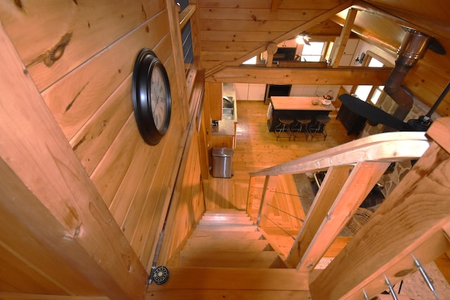 108 Maple Rd, Atkinson, ME 04426 - stairs with wooden walls and lofted ceiling
