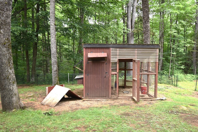 108 Maple Rd, Atkinson, ME 04426 - view of poultry coop featuring a view of trees