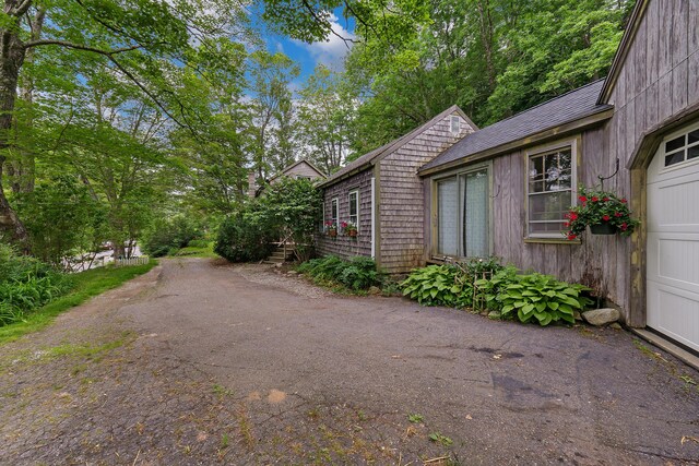 131 River Rd, Newcastle, ME 04553 - view of side of property featuring a garage
