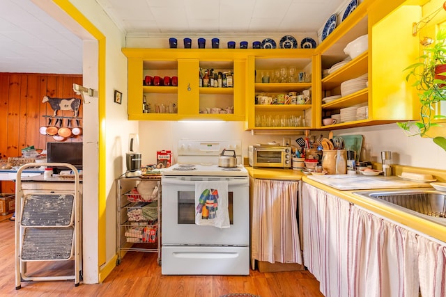 131 River Rd, Newcastle, ME 04553 - kitchen featuring white electric range, light wood-type flooring, open shelves, and light countertops