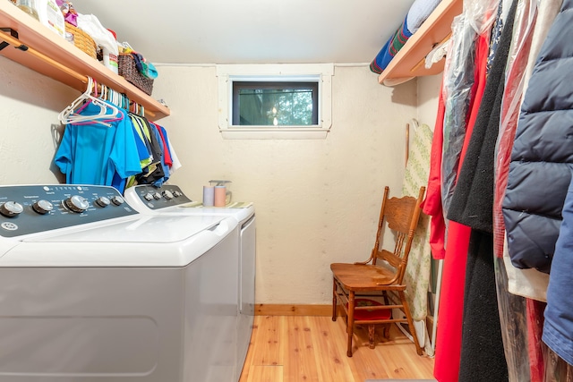 131 River Rd, Newcastle, ME 04553 - washroom featuring light wood-type flooring and separate washer and dryer