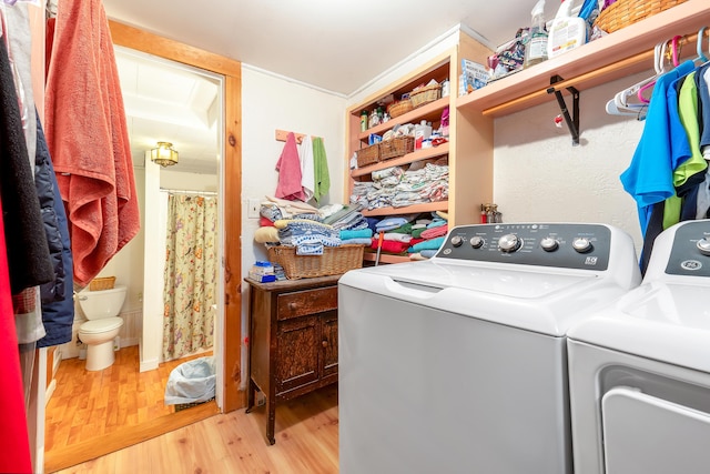 131 River Rd, Newcastle, ME 04553 - washroom featuring washing machine and clothes dryer and light wood-type flooring