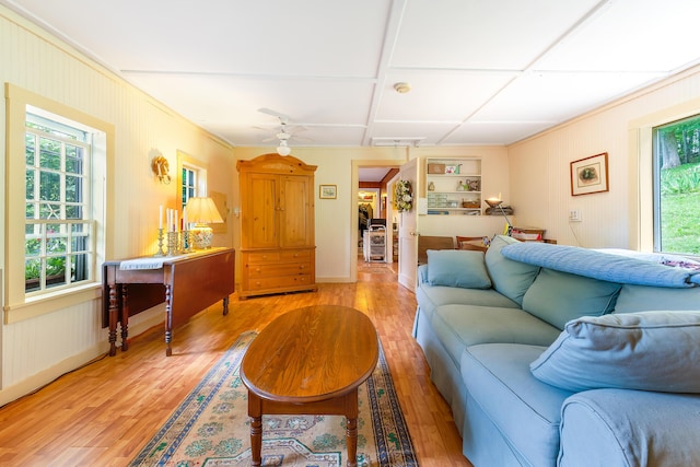 131 River Rd, Newcastle, ME 04553 - living area featuring healthy amount of natural light, light wood-type flooring, ceiling fan, and ornamental molding