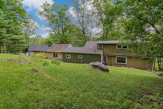 131 River Rd, Newcastle, ME 04553 - back of house featuring a yard
