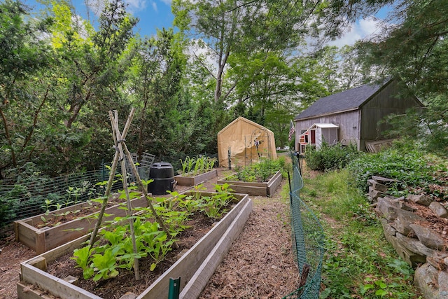 131 River Rd, Newcastle, ME 04553 - view of yard featuring a storage shed and a vegetable garden