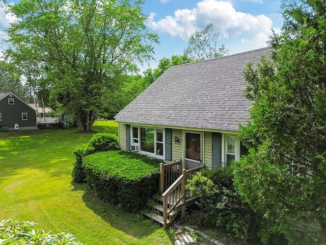 77 W River Rd, Waterville, ME 04901 - view of front of home featuring a front yard and roof with shingles