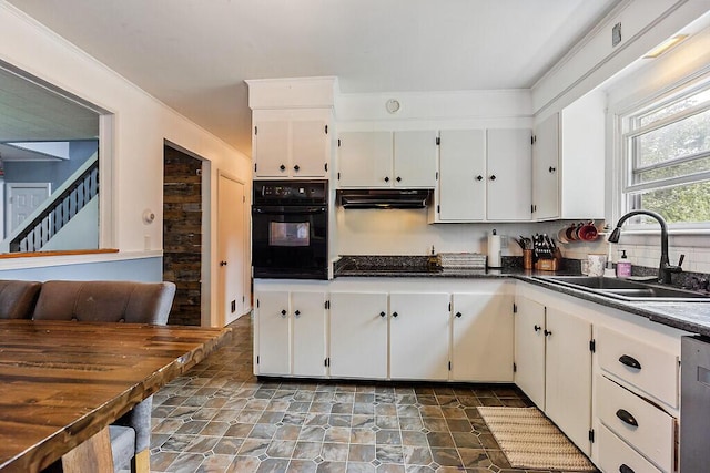 77 W River Rd, Waterville, ME 04901 - kitchen with black appliances, stone finish flooring, under cabinet range hood, and white cabinets