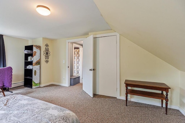 77 W River Rd, Waterville, ME 04901 - bedroom featuring carpet floors, a baseboard heating unit, and vaulted ceiling