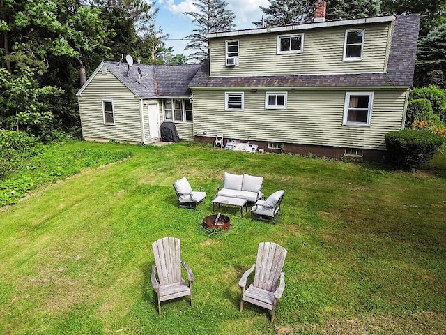 77 W River Rd, Waterville, ME 04901 - back of house featuring a yard, a chimney, cooling unit, and roof with shingles