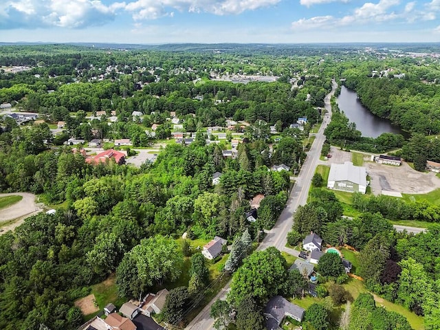 77 W River Rd, Waterville, ME 04901 - aerial view of property's location with a nearby body of water and a heavily wooded area