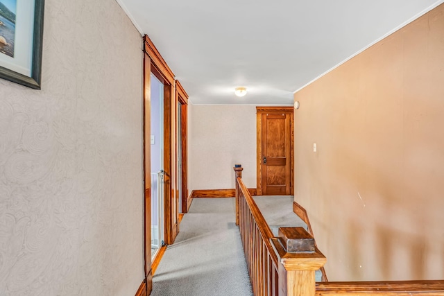 131 Pleasant St, Dexter, ME 04930 - corridor featuring an upstairs landing and light colored carpet