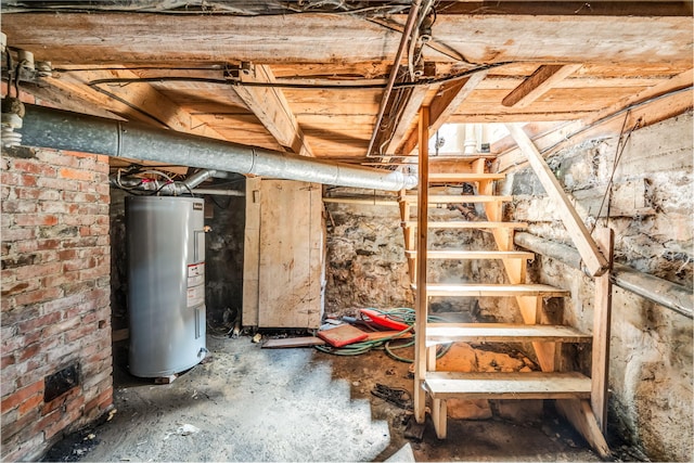 131 Pleasant St, Dexter, ME 04930 - unfinished below grade area featuring water heater