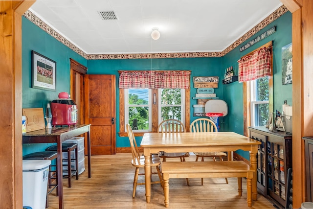 131 Pleasant St, Dexter, ME 04930 - dining space with wood-type flooring and plenty of natural light