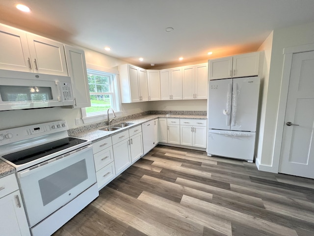 43 Tinker Meadow Way Unit 19, Ellsworth, ME 04605 - kitchen with white appliances, white cabinets, wood finished floors, recessed lighting, and light stone countertops