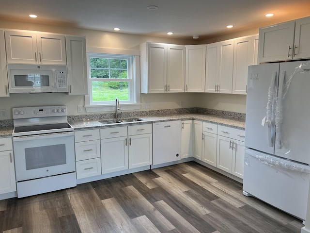 43 Tinker Meadow Way Unit 19, Ellsworth, ME 04605 - kitchen featuring white appliances, recessed lighting, light stone countertops, dark wood-type flooring, and white cabinetry