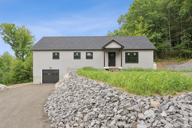 127 Bond Brook Rd, Augusta, ME 04330 - ranch-style home featuring a garage, asphalt driveway, and roof with shingles