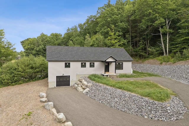 127 Bond Brook Rd, Augusta, ME 04330 - view of front of home featuring driveway, an attached garage, and a shingled roof