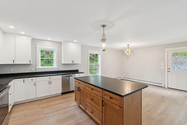 127 Bond Brook Rd, Augusta, ME 04330 - kitchen with baseboard heating, appliances with stainless steel finishes, dark countertops, plenty of natural light, and recessed lighting