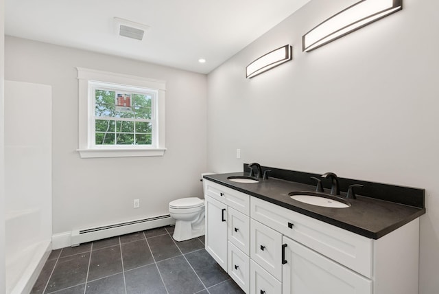 127 Bond Brook Rd, Augusta, ME 04330 - full bath featuring a baseboard radiator, tile patterned floors, double vanity, and recessed lighting