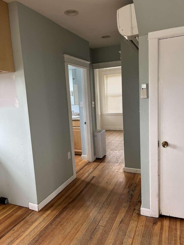 107 May St, Biddeford, ME 04005 - hall featuring hardwood / wood-style flooring and baseboards