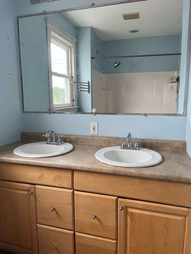 107 May St, Biddeford, ME 04005 - full bath featuring double vanity and a shower