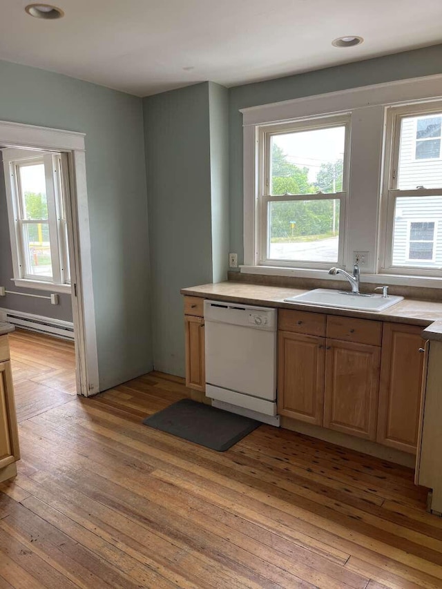 107 May St, Biddeford, ME 04005 - kitchen with dishwasher, a baseboard radiator, light wood-type flooring, light countertops, and recessed lighting