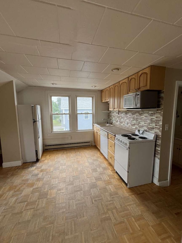 107 May St, Biddeford, ME 04005 - kitchen featuring white appliances, a baseboard heating unit, tasteful backsplash, and light countertops