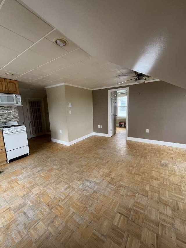 107 May St, Biddeford, ME 04005 - unfurnished living room featuring ceiling fan and ornamental molding