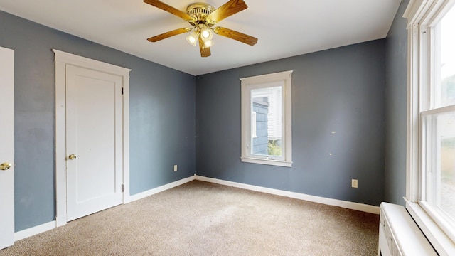 69 Androscoggin Ave, Lewiston, ME 04240 - carpeted spare room featuring ceiling fan and baseboards