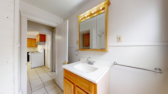 69 Androscoggin Ave, Lewiston, ME 04240 - bathroom with vanity and tile patterned floors
