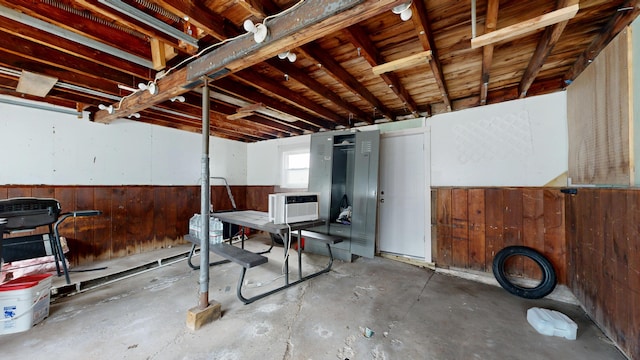 69 Androscoggin Ave, Lewiston, ME 04240 - basement featuring wood walls and a wainscoted wall