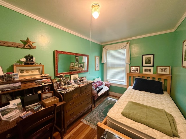 610 E Sangerville Rd, Sangerville, ME 04479 - bedroom featuring crown molding and wood finished floors